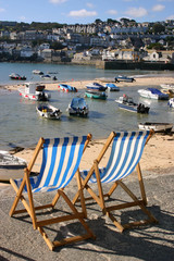 colorful deckchairs, st. ives, cornwall