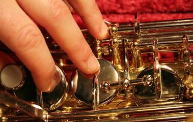 Fototapeta premium hand on saxophone