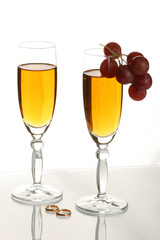 champagne and wedding rings