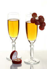 champagne and wedding rings