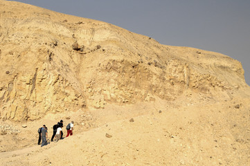 Fototapeta na wymiar walkers in a desert