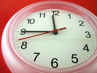 white clock on red