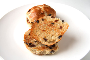 traditional hot cross buns whole and sliced