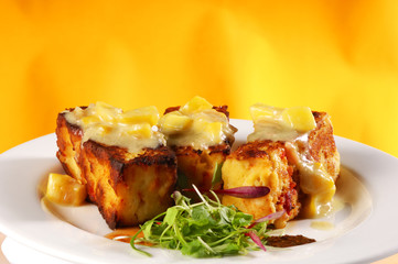 lobster bread pudding and mango wine sauce