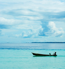 Fototapeta premium sea gypsies children kayaking