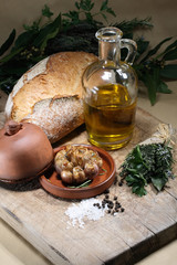 roasted garlic, olive oil, bread and herbs