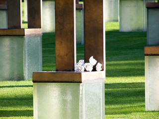 memorial chair w/ flowers  @ okc national memorial