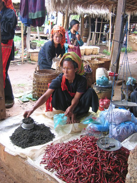 birman woman working on the market, myanmar