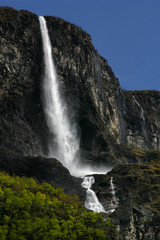 waterfall along fjord in Norway