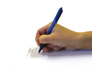 female hand writing on paper