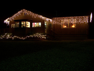 christmas lights on a house at night