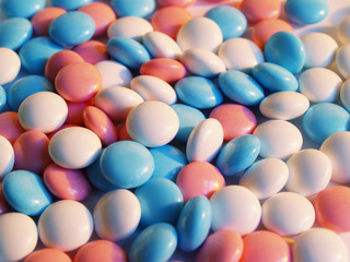 blue, white and pink pills