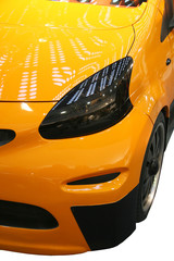 head light of a modern yellow car