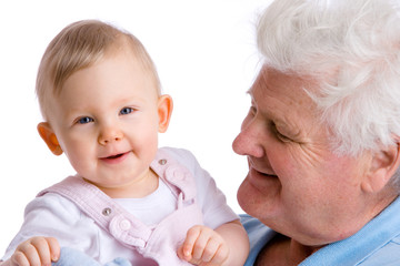 smiling baby with grandfather