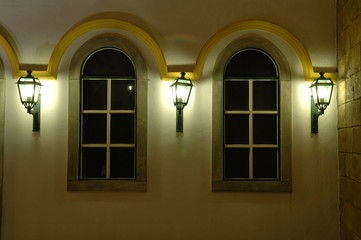 facade of windows and antique lanterns