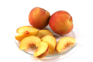 Fototapeta na wymiar looking down at peaches on a plate
