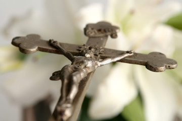 cross and easter lilies