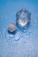 melting ice on blue background vertical (1)