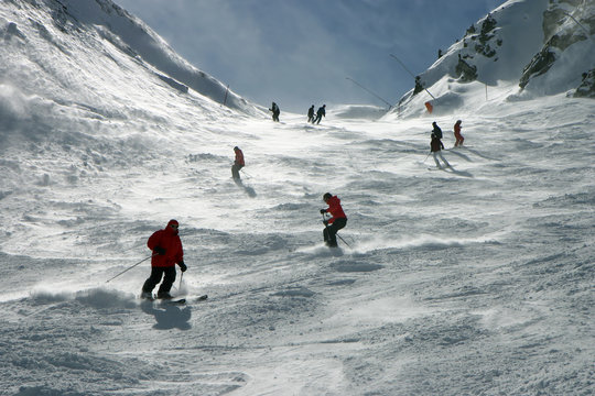 skiers in the alps