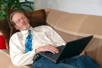 businessman with  laptop sleeping