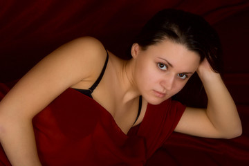 Fototapeta premium portrait of the young sexual girl on a dark background