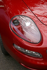 red supercar headlight