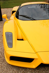 front side of yellow supercar