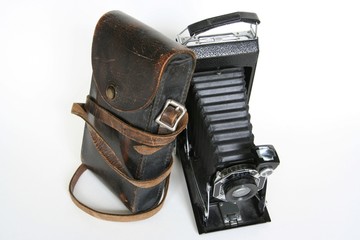 antique folding camera with leather case