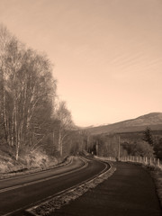 open road in the scottish highlands