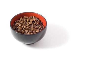 coffee beans in bowl isolated on white background