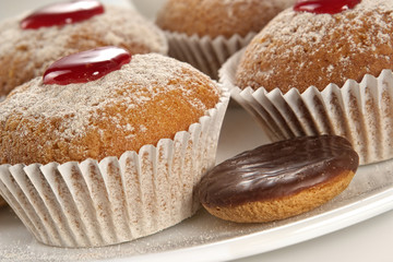 appetizing fruitcakes and chocolate cookies