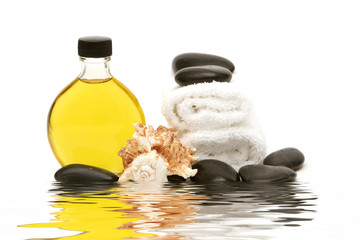 spa towels, oil and rocks