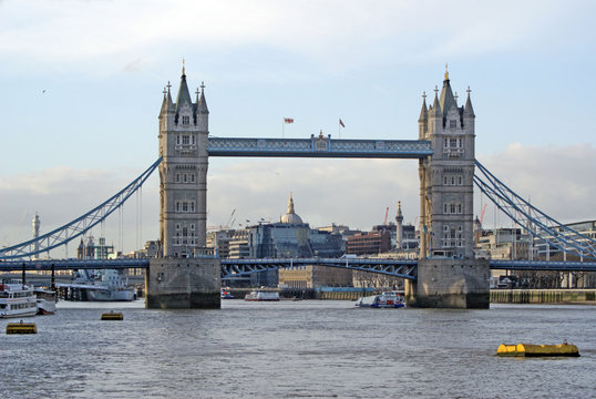 day view of tower bridge,boats,st.paul's cathedral