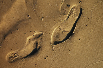 Fototapeta na wymiar human trace on sand