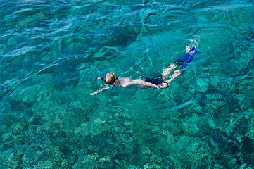 boy snorkelling in the ocean