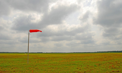 windsock under clouds