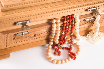 jewelry box with jewels hanging out (close-up)