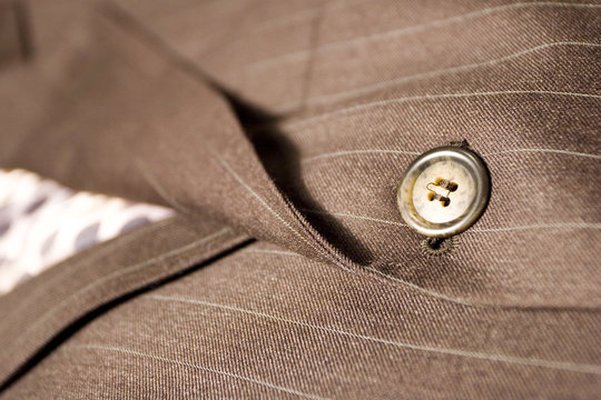 detail sur un bouton de costume