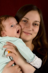 young mum of the embracing favourite son