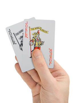 hand with playing cards (two jokers)