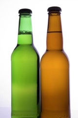 two beer bottles with no labels