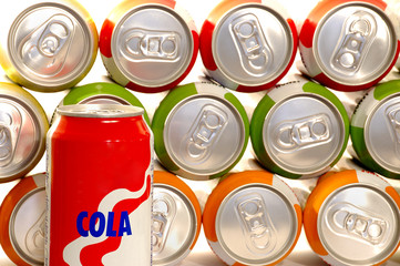 color aluminum drink cans piled