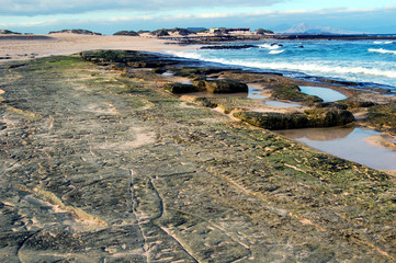 sandy beach tide