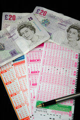 english bank notes and lottery tickets