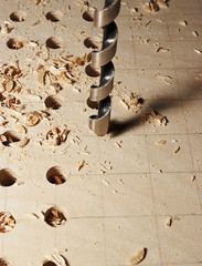drilling of apertures in a sheet of plywood - 2911043