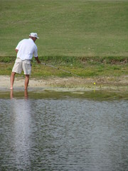 retreiving golf balls