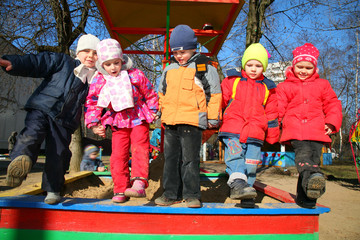 five childrens in kindergarten at spring