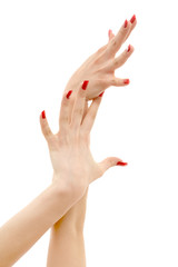 two hands with red nails