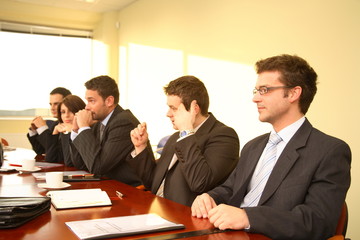 five business persons at a conference,interview