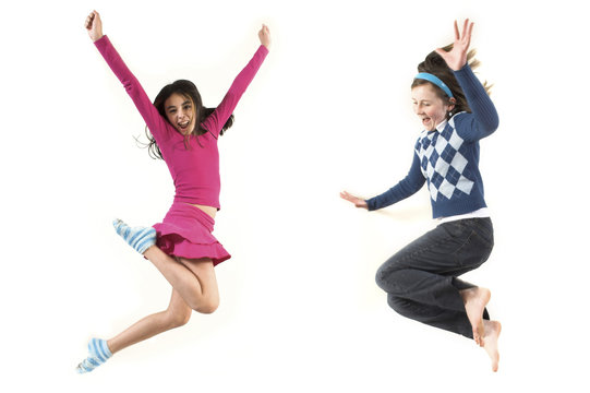 teen jumping together